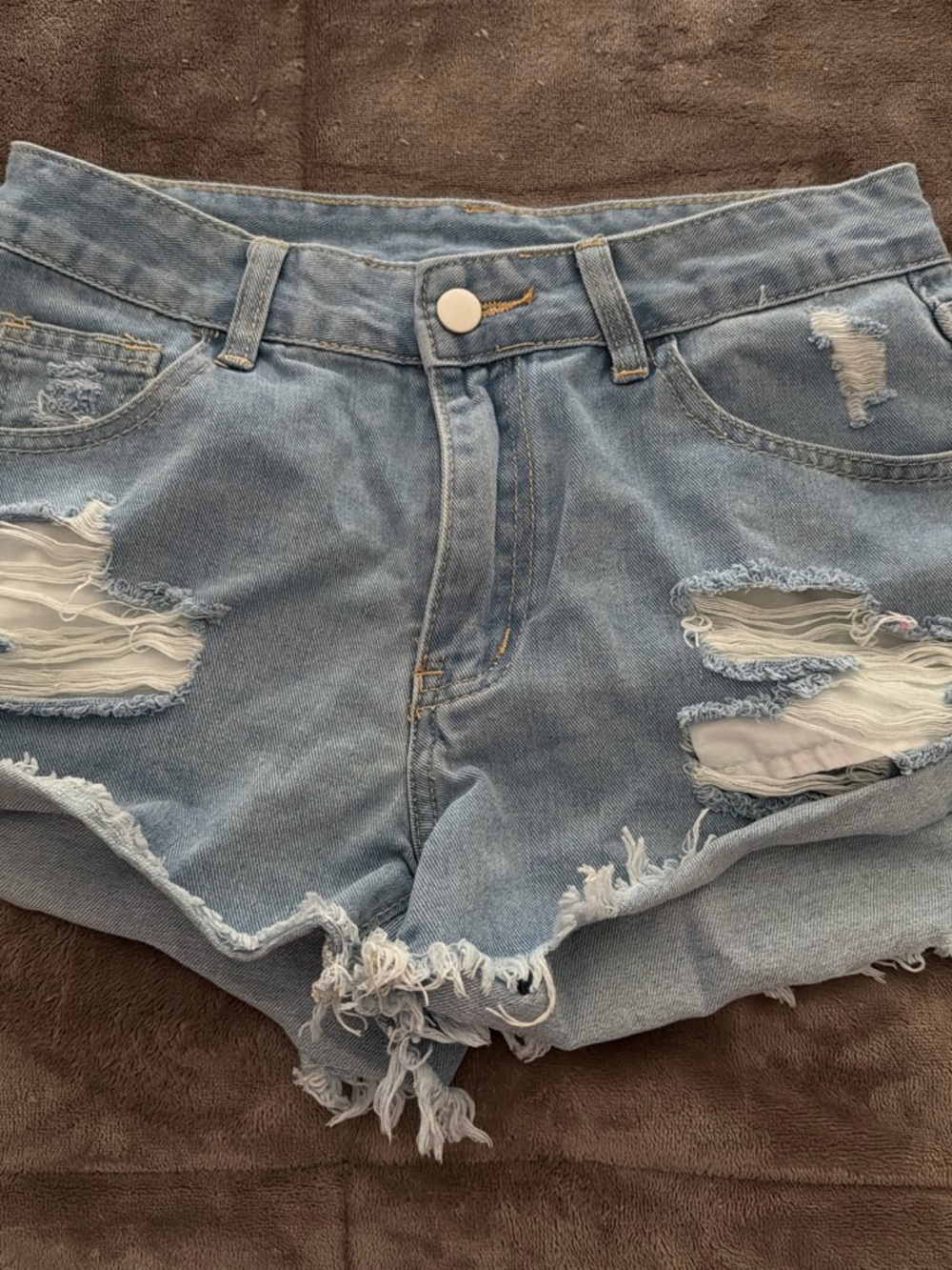 SHEIN Light Blue Ripped Denim Cutoff Shorts
